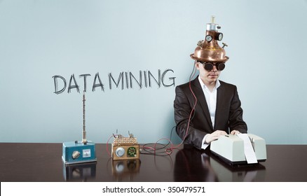 Data Mining Concept With Vintage Businessman And Calculator At Office