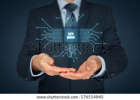 Data mining (data-minig) concept. Abstract symbol of a chip with text data mining connected with data represented by points.