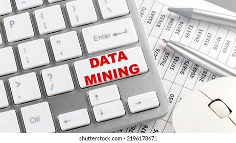 DATA MINING Text On Keyboard Wirh Chart And Pencil