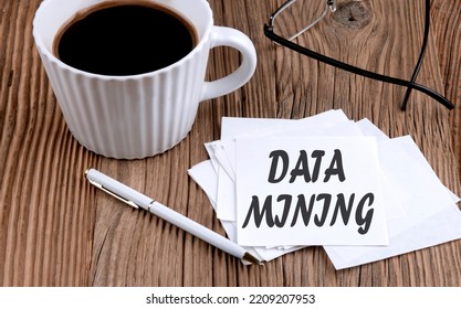 DATA MINING Text On A Sticky With Coffee And Pen On Wooden Background