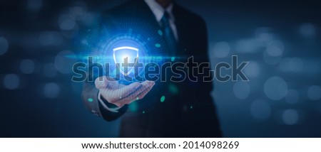 Data or network protection, businessman press shield icon, web button, virus cyber security. Insurance Digital crime by hacker concepts. Information security against viruses, System binary Matrix.