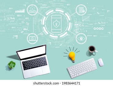 Data Privacy concept with computers with a light bulb from above