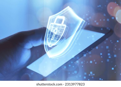 Data privacy, internet access and cyber security concept with keyhole inside closed padlock and shield hologram on man hand using modern smartphone background, double exposure