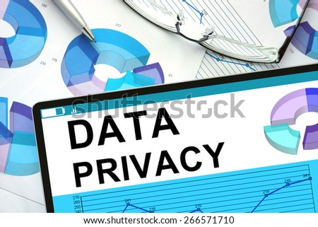 Data Privacy  on tablet with graphs. Business concept.                