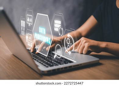 Data processing concept, Person working on laptop computer with data processing icon on virtual screen.