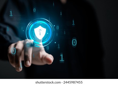 Data protection concept, network security system and cybersecurity. Person touching Shield protect icon on virtual screen.