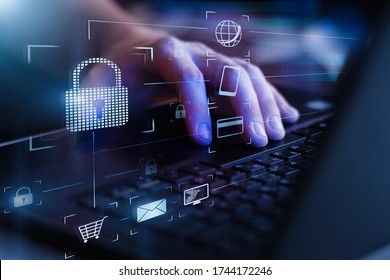 Data protection and secure online payments. Cyber internet security technologies and data encryption . Closeup view of man`s hand using laptop with virtual digital screen with icon of lock on it. - Shutterstock ID 1744172246