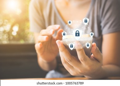 Data Protection And Security Important Information In Your Mobile Phone, Woman Hand Using Smartphone And Icon Key On Shield