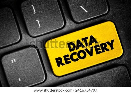 Data recovery - process of salvaging deleted, lost, corrupted, damaged or formatted data from removable media or files, text concept button on keyboard