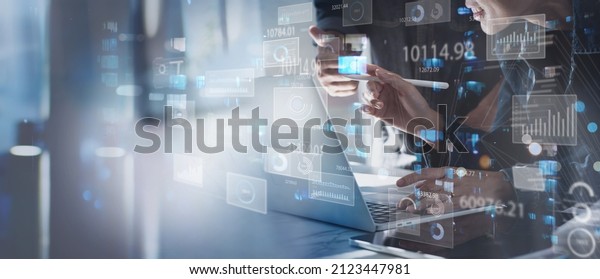Data science, business analysis and strategy,\
big data concept.Business teamwork analyzing financial graph on\
virtual touch screen, futuristic technology solution for business\
development