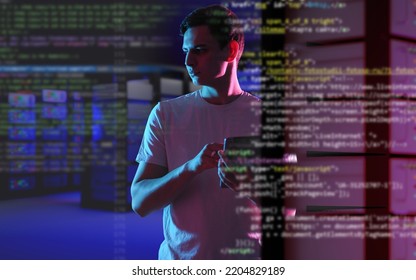 Data science. Man Data Science Specialist. Guy with tablet works in IT. Data science specialist is holding tablet. Information processing. Servers with neon light behind man. Blurred program code