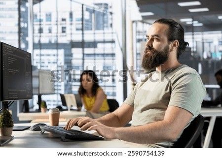 Data scientist doing software quality assurance, reading source code on computer before implementing it. IT employee in office inspecting coding on PC device, looking to fix potential issues