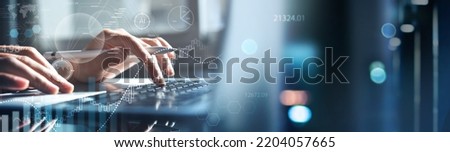 Data scientist, Programmer using laptop analyzing financial data on futuristic virtual interface. Algorithm. Global business development, strategy and planning, digital technology, market research