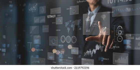 Data Scientists. Business Plan And Strategy Analysis. Businessman Working On Virtual Screen With Financial Graph, Big Data. Algorithm. Marketing And Deep Learning Of Artificial Intelligence