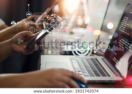 Data scientists. Team programmer using laptop analyzing and development at various information on futuristic virtual interface. Algorithm. Marketing and deep learning of artificial intelligence. 