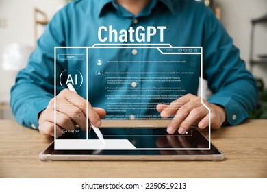 Data search concept using artificial intelligence chatbot ChatGPT, young businessman chatting with smart chatbot To find business economic information, artificial intelligence developed by OpenAI. - Shutterstock ID 2250519213