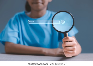 Data search technology browsing Internet data information networking. A girl holding magnifying glass searching icon for information on internet network. Search Engine optimization concept.