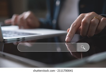 Data Search Technology Search Engine Optimization SEO Concept. Business Woman Hand Using Digital Tablet And Laptop Computer Searching Information, Search Console For Website.