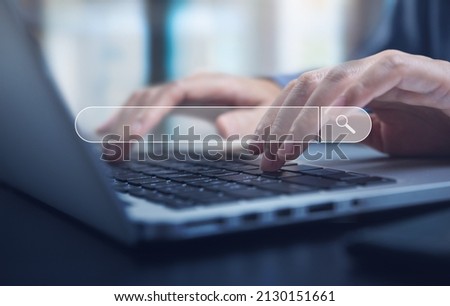 Data Search Technology Search Engine Optimization (SEO). Woman's hands  typing on laptop computer keyboard to search the information, online content.