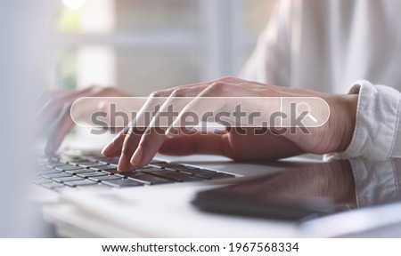 Data Search Technology SEO Search Engine Optimization concept. Woman's hands typing on laptop computer keyboard surfing the internet to search for information on web browser.