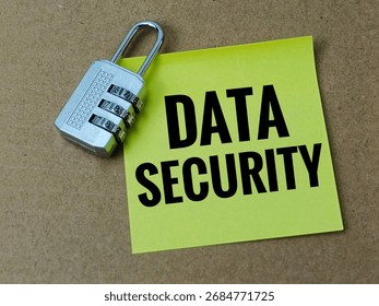 Data Security Concept with Padlock and Note on Brown Background, Digital Protection Symbol for Online Privacy, Cybersecurity in Business, Technology and Information Safety. 