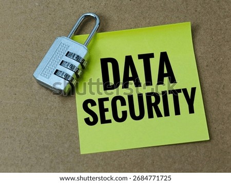 Data Security Concept with Padlock and Note on Brown Background, Digital Protection Symbol for Online Privacy, Cybersecurity in Business, Technology and Information Safety. 