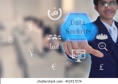 data security  concept  presented by  businessman touching on  virtual  screen - image element furnished by NASA- SOFT SILVER TONE