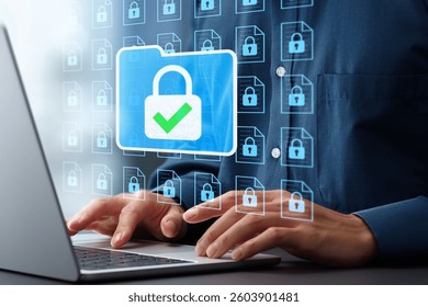 Data security and document management system DMS. Folder encryption and access control. Businessman using laptop computer with secure file storage and archiving system.