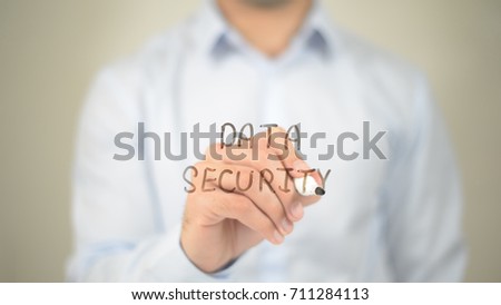 Data Security,  Man writing on transparent screen
