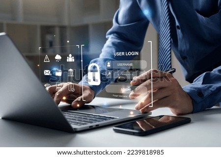 Data Security system concept, User privacy security and encryption. Businessman using laptop with login screen.