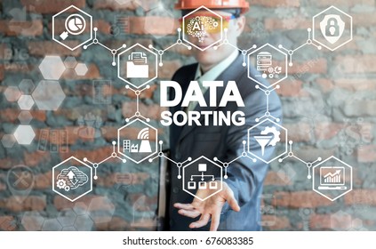 Data Sorting Industry 4.0 IT Integration Technology Smart Manufacturer concept. Man offers data sorting words icon on virtual screen. - Shutterstock ID 676083385