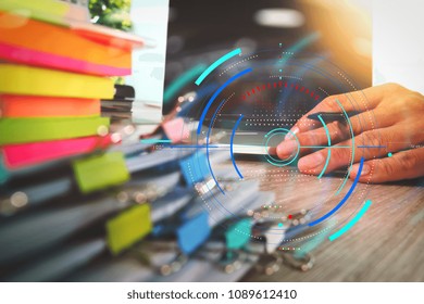 Data statistics charts and key performance indicators diagram.business documents on office table with smart phone and digital tablet and graph business with social network diagram and man working.