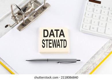 DATA STEWARD - Business Concept, Message On Sticker On Folder Background With Calculator