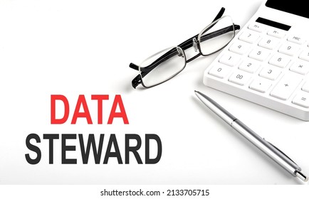 DATA STEWARD Concept. Calculator,pen And Glasses On The White Background