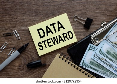 DATA STEWARD Text On Sticker On Notebook With Magnifier And Chart. Business