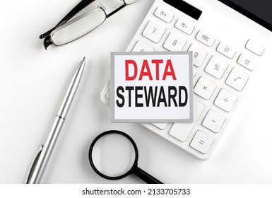 DATA STEWARD Text On Sticker With Calculator, Glasses And Magnifier