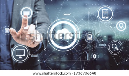 Data storage concept with businessman pushes button on touch screen with cloud service icons. Double exposure