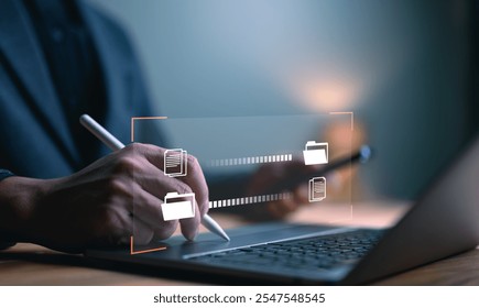 Data Sync concept, Transfer file of data between folder, Backup data, Exchange of file on folder, Send document in internet, DMS. Virtual document loading to another folder, Man working with laptop.