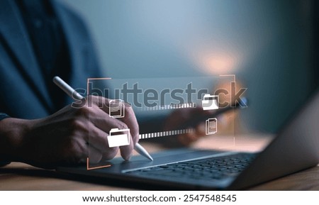 Data Sync concept, Transfer file of data between folder, Backup data, Exchange of file on folder, Send document in internet, DMS. Virtual document loading to another folder, Man working with laptop.