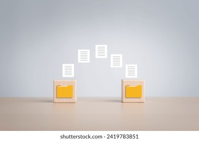 Data Synchronize Transfer, Copy or Move data files between folders, Backup sync data, Exchange files in folder, Send documents to cloud. Wooden blocks with virtual document load to another folder.