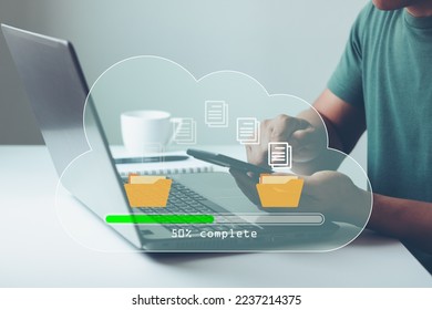 Data transfer concept. Transfer files data system relocation, Person hand using smartphone and laptop computer waiting for transfer file process with loading bar icon on virtual screen. Data backup. - Powered by Shutterstock - Get 15% off with code: PIKWIZARD15
