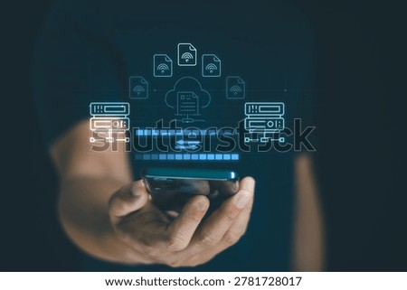 Data transfer concept, internet server connection. Person holding smartphone with data host server storage icon for information exchange and transfer. FTP ( File Transfer Protocol ).