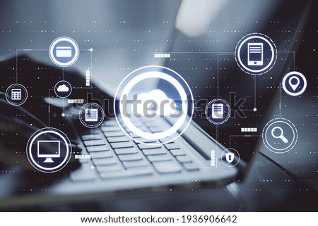 Data transfer technology concept with virtual cloud service icons and hands on laptop keyboard. Double exposure