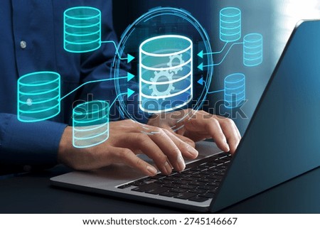 Data warehouse. Integrated database for big data analytics. Businessperson using laptop computer for business intelligence.