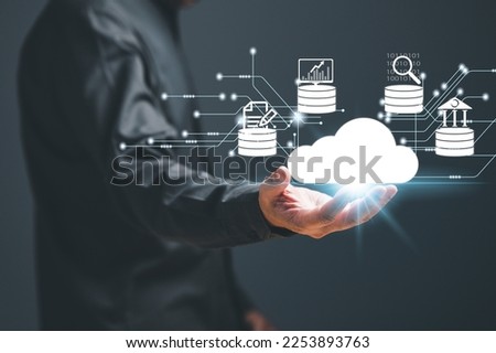 A Database administrators backup company and customer data concept. Databases, computer, DBMS, DBA, database, SQL, and cloud stored. Software engineering is restoring data to servers. black background