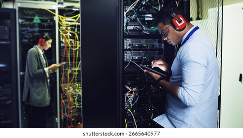 Database, maintenance and tablet with IT professional in server room for cybersecurity support. App, infrastructure and inspection with people in networking hub for service or technical engineering
