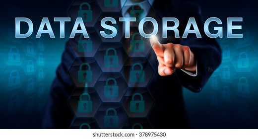 Database manager is pushing DATA STORAGE on a touch screen interface. Technology and business concept. Many locked padlock icons embedded in a hexagonal structure do represent reliable data storage.