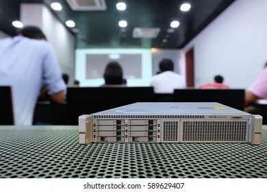 Database server on Table mesh in training or conference room and blur background