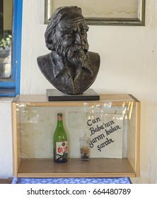 Datca, Turkey - August 30, 2015: Last Wine Of Turkish Poet Can Yücel And His Bust.