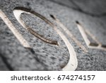 Date 1914 of the beginning of the first world war engraved in golden letters on the famous Infantry Memorial of Brussels reminding of World War I and World War II; in brussels in belgium